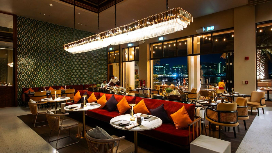 Waterfront evening atmosphere at Zeera by Buddha-Bar Yas Bay