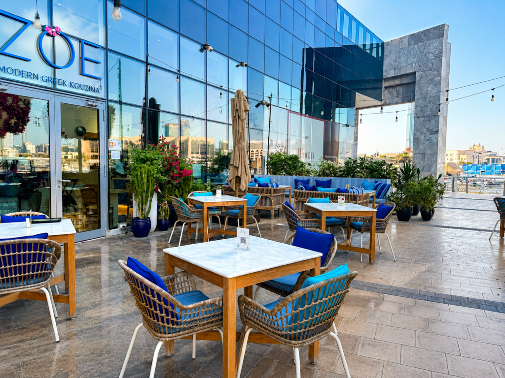 Blue and white waterfront terrace at ZOE Marsa Al Bateen