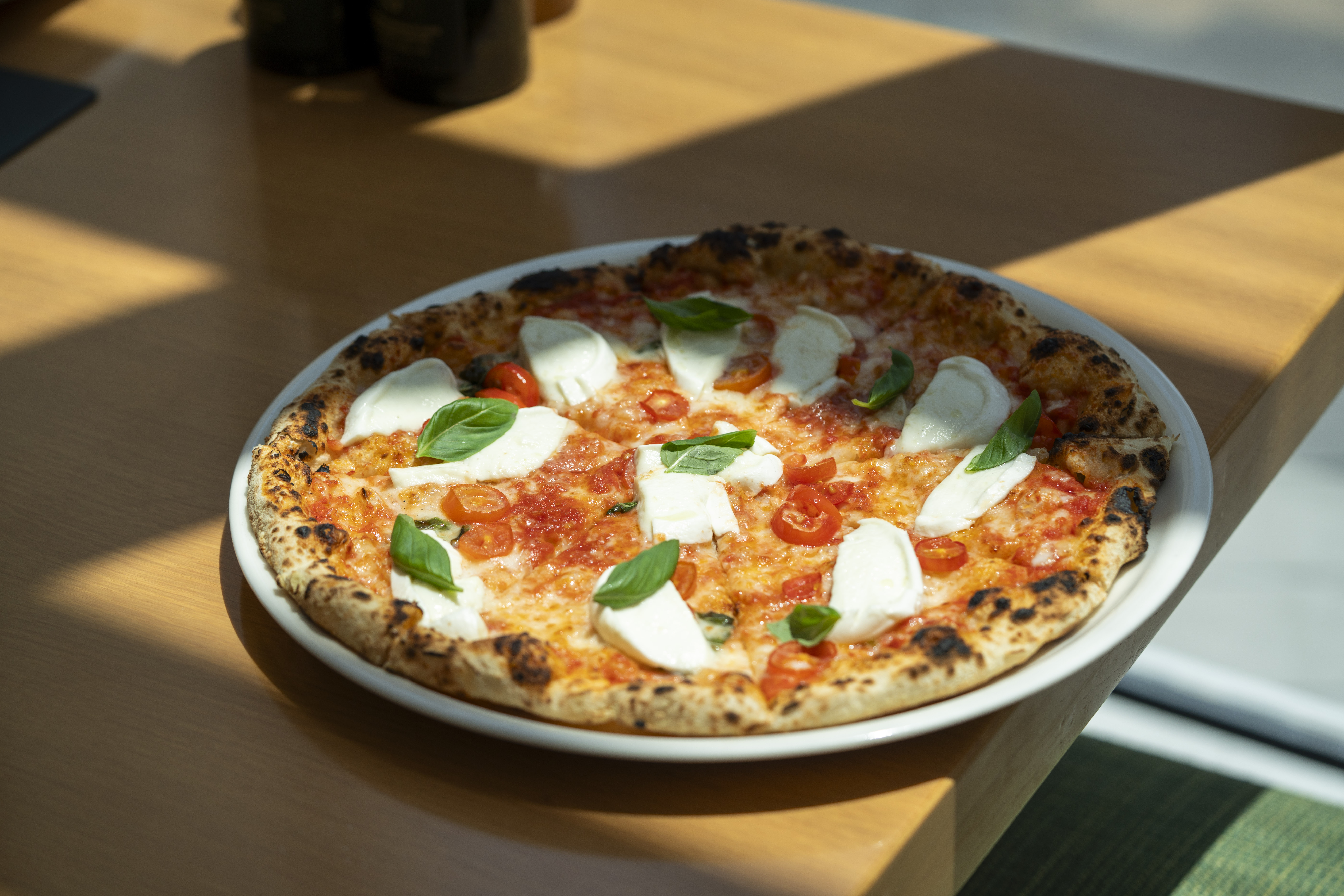 Wood fired margherita pizza at Prego's, Beach Rotana Abu Dhabi
